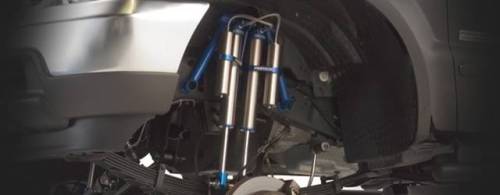 Fabtech Motorsports - 1999-2004 Ford F250/350 4WD 8 Inch Multiple Front Shock System with Black Dirt Logic 2.25 Resi Shocks