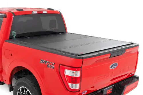 Rough Country - 49214651 | Rough Country Hard Tri-Fold Flip Up Tonneau Bed Cover (1999-2016 F250, F350 Super Duty 2WD/4WD | 6'10" Bed)