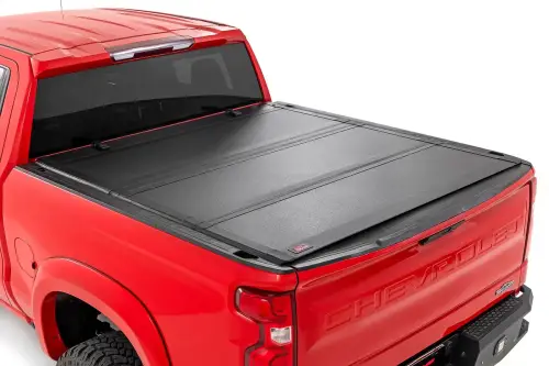 Rough Country - 49120650 | Rough Country Hard Tri-Fold Flip Up Tonneau Bed Cover For Chevrolet Silverado 1500 / GMC Sierra 1500 | 2019-2023 | 6' 7" Bed