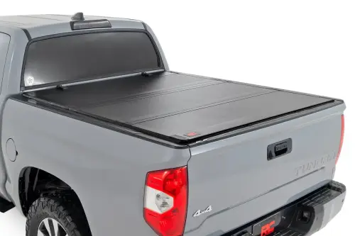 Rough Country - 49414551 | Rough Country Hard Tri-Fold Flip Up Tonneau Bed Cover For Toyota Tundra | 2007-2021 | 5' 7" Bed