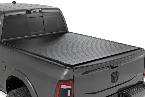 Rough Country - 50309650  | Rough Country Hard Roll Up Bed Cover For Ram 1500 (2009-2018) / 2500 (2010-2024) | 6' 4" Bed