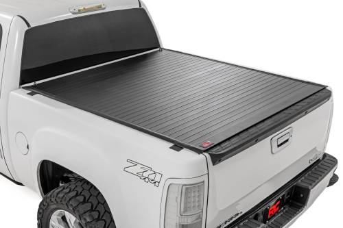 Rough Country - 50123551 | Rough Country Hard Roll Up Bed Cover For Chevrolet Silverado 1500 / GMC Sierra 1500 | 5'9" Bed With Rail Caps