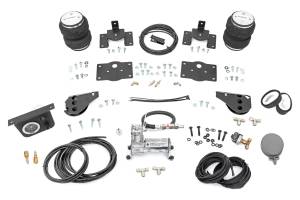 Rough Country - 10032C | Rough Country Air Spring Kit For Ram 1500 / 1500 Classic 4WD | 2009-2023 | For Model At Stock Height, Includes Onboard Air Compressor - Image 1