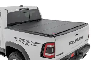 49320550 | Rough Country Hard Tri-Fold Flip Up Bed Cover (2019-2025 Ram 1500 2WD/4WD | 2021-2025 Ram 1500 TRX AWD/4WD | 5'7" Bed)