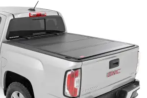 49120500 | Rough Country Hard Tri-Fold Flip Up Bed Cover (2015-2024 Colorado, Canyon | 5' Bed)