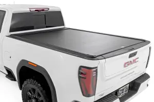 56110690 | Rough CountryÊPowered Retractable Bed Cover (2020-2025 Silverado, Sierra 2500 HD, 3500 HD 2WD/4WD | 6'9" Bed)