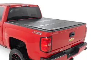 49119551 | Rough Country Hard Tri-Fold Flip Up Bed Cover (2014-2018 Silverado, Sierra 1500 2WD/4WD | 2014-2019 Silverado, Sierra 2500 HD, 3500 HD 2WD/4WD | 5'9" Bed)