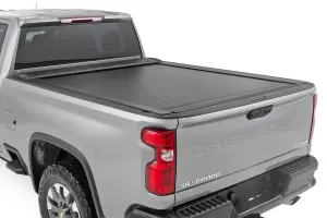 Rough Country - 46110690 | Rough Country Retractable Bed Cover For Chevrolet Silverado/GMC Sierra 2500 HD/3500 HD | 2020-2024 | 6'9" Bed - Image 1