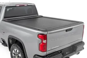 46110690 | Rough Country Retractable Bed Cover (2020-2025 Silverado, Sierra 2500 HD, 3500 HD 2WD/4WD | 6'9" Bed)