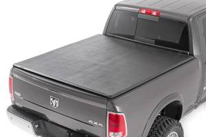 41319640 | Rough Country Soft Tri-Fold Bed Cover (2009-2018 Ram 1500 2WD/4WD | 2009-2024 Ram 2500, 3500 2WD/4WD | 6'4" Bed)