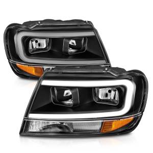 111537 | Anzo USA Crystal Headlights w/ Light Bar Black (1999-2004 Grand Cherokee)