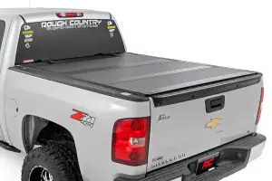 49113551 | Rough Country Hard Tri-Fold Flip Up Bed Cover (2007-2013 Silverado, Sierra 1500 2WD/4WD | 5'9" Bed)