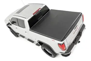 41308650 | Rough Country Soft Tri-Fold Bed Cover (2019-2025 Silverado, Sierra 1500 2WD/4WD 6'7" Bed | Standard Bed)