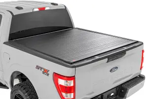 50221550 | Rough Country Hard Roll Up Bed Cover (2015-2024 F150 Pickup 2WD/4WD | 5'7" Bed)