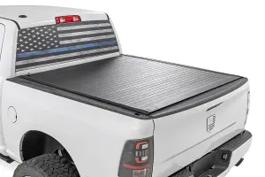 50319550 | Rough Country Hard Roll Up Bed Cover For Ram 1500 (2009-2018) / 2500 (2010-2024) | 5' 7" Bed