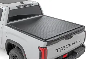 50514551 | Rough Country Hard Roll Up Bed Cover For Toyota Tundra 2WD/4WD | 5'7" Bed