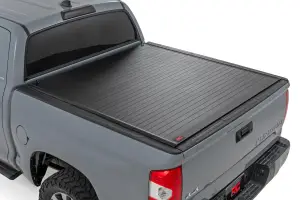 50514550 | Rough Country Hard Roll Up Bed Cover For Toyota Tundra | 5'7" Bed