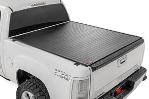 Copy of 50123551 | Rough Country Hard Roll Up Bed Cover For Chevrolet Silverado 1500 / GMC Sierra 1500 | 5'9" Bed With Rail Caps