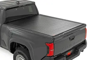 50410600 | Rough Country Hard Roll Up Bed Cover For Toyota Tacoma 2WD/4WD | 6' Bed
