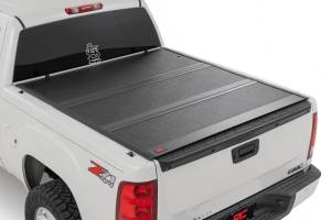 47113550B | Rough Country Hard Low Profile Bed Cover For Chevy Silverado /GMC Sierra 1500 | 5' 9" Bed Without Rail Caps