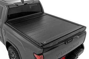 Rough Country - 53514551 | Rough Country Manual Retractable Bed Cover, 5'7" Bed For Toyota Tundra 2WD/4WD - Image 1
